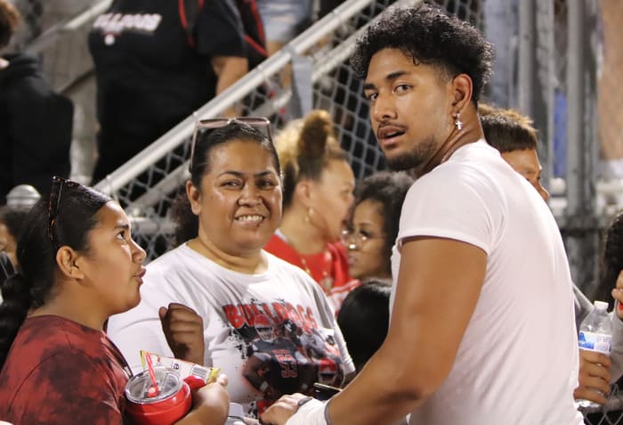 Paki Finau (right) and his mom Si’i (middle) after another big win.